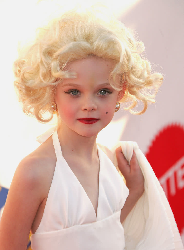 as a kid dressed as marilyn monroe