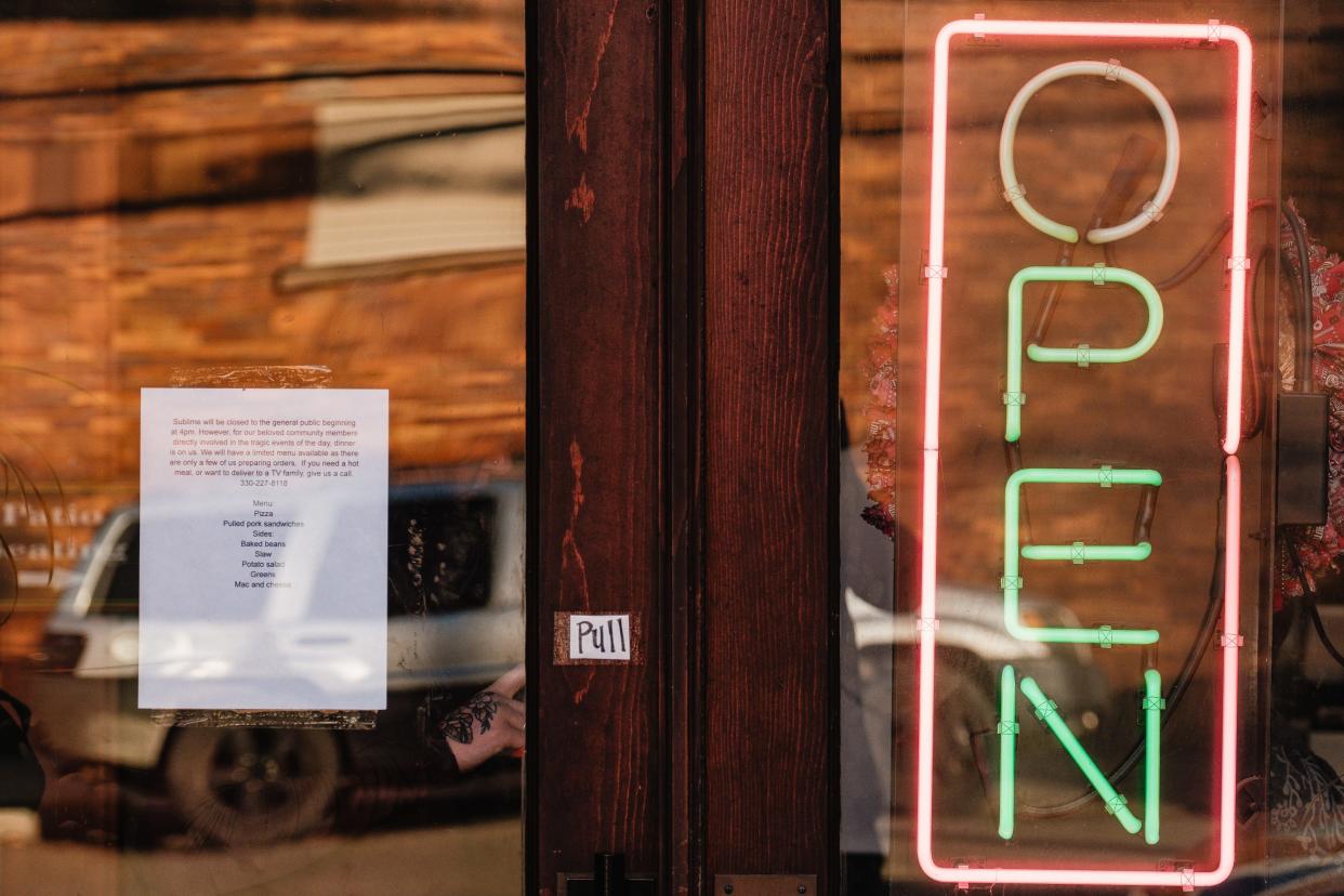 A sign is seen posted at the front entrance of Sublime Smoke, Tuesday, Nov. 14 in Bolivar, Ohio. The business closed to the public at 4 p.m. in order to serve any and all affected by the bus crash in Licking County involving Tusky Valley students, chaperones, and others.