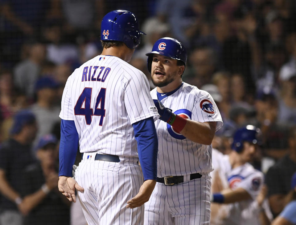 Chicago Cubs' Kyle Schwarber, right, celebrates with Anthony Rizzo (44) at home plate after hitting a two-run home run during the third inning of the team's baseball game against the San Francisco Giants on wWednesday, Aug 21, 2019, in Chicago. (AP Photo/Paul Beaty)