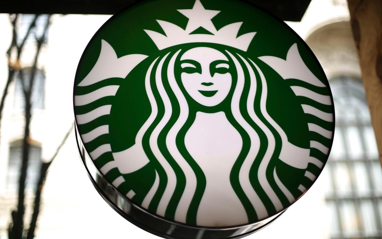 Starbucks is banning plastic straws - AP