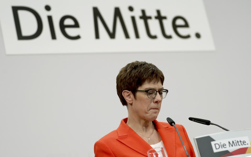 Annegret Kramp-Karrenbauer, chairwoman of the German Christian Democratic Union (CDU), attends a press conference at the party's headquarters in Berlin, Germany, Friday, Feb. 7, 2020. Slogan in the background reads 'The Centre'. (AP Photo/Michael Sohn)