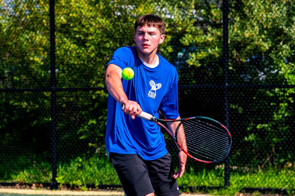 Fairhaven's Isaac Petruski llines up his backhanded shot.