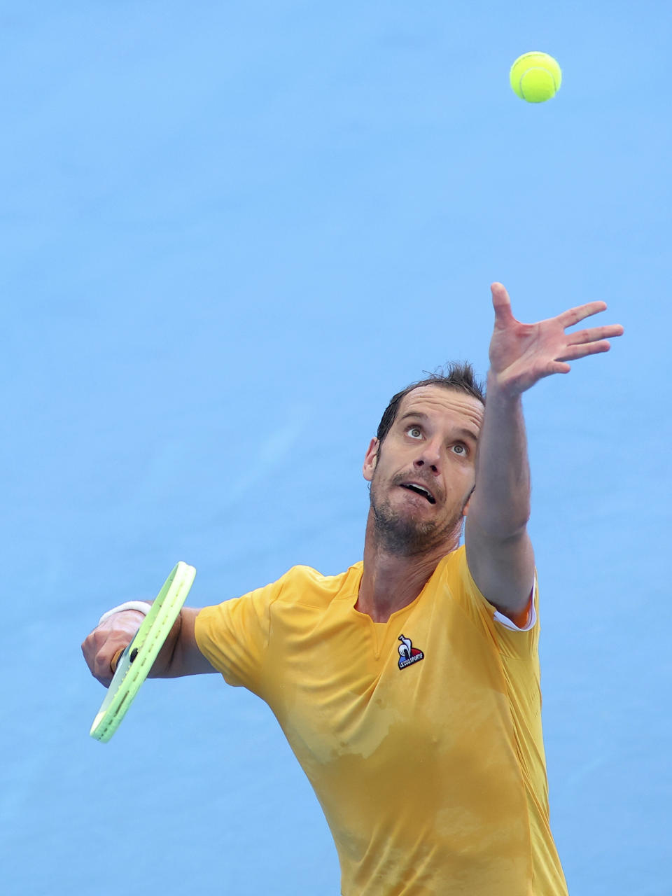 Richard Gasquet of France serves to Marcos Giron of the United States during their Round of 32 match at the Adelaide International tennis tournament in Adelaide, Australia, Sunday, Jan. 1, 2023. (AP Photo/Kelly Barnes)