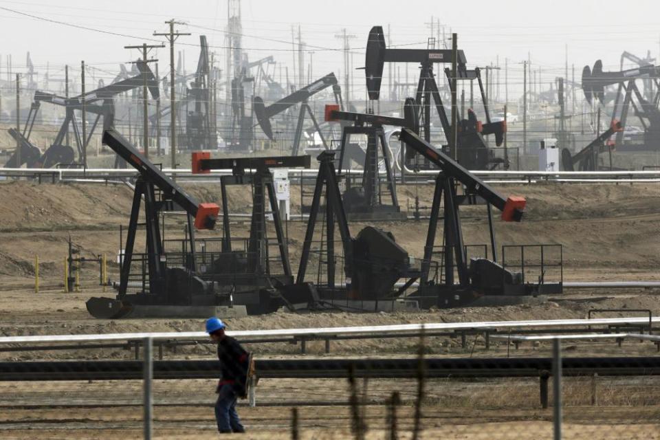 Pumpjacks operating at the Kern River Oil Field in Bakersfield. Roughly 1 in 7 workers in Kern are employed by the industry or tied to it.