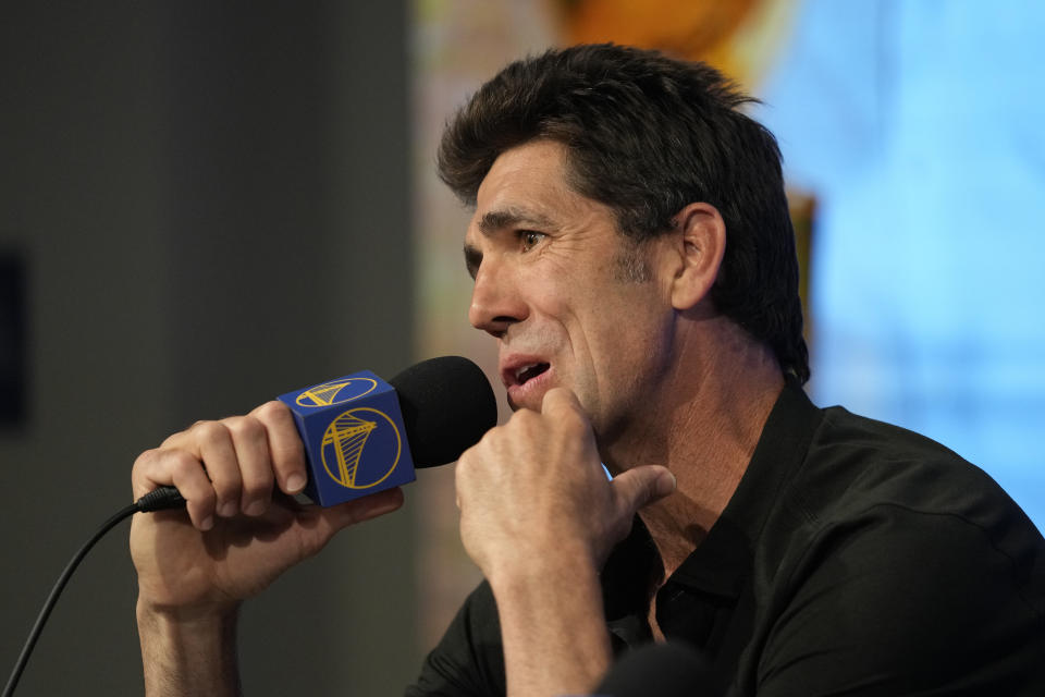 Golden State Warriors president and general manager Bob Myers makes a statement during an NBA basketball news conference in San Francisco, Tuesday, May 30, 2023. Myers is departing the Warriors after building a championship team that captured four titles in an eight-year span. One of the most successful GMs over the past decade in any sport, Myers' contract was set to expire in late June. (AP Photo/Eric Risberg)