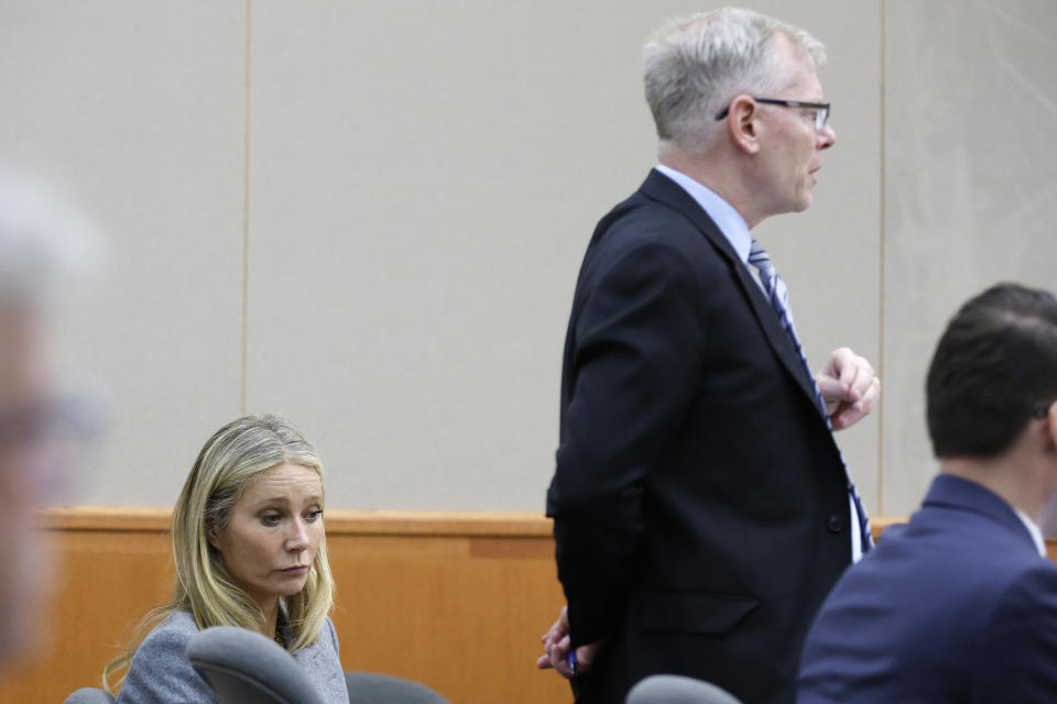 Gwyneth Paltrow sits in court during an objection in her trial, Thursday, March 23, 2023, in Park City, Utah, where she is accused in a lawsuit of crashing into a skier during a 2016 family ski vacation, leaving him with brain damage and four broken ribs. Terry Sanderson claims that the actor-turned-lifestyle influencer was cruising down the slopes so recklessly that they violently collided, leaving him on the ground as she and her entourage continued their descent down Deer Valley Resort, a skiers-only mountain known for its groomed runs, après-ski champagne yurts and posh clientele. (AP Photo/Jeff Swinger, Pool)