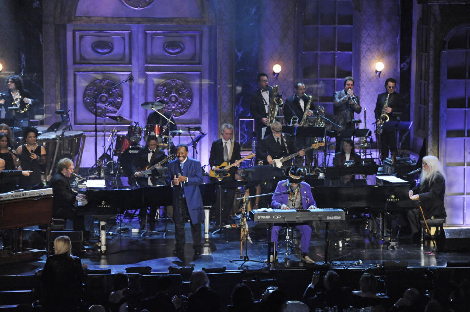 FILE - In this March 15, 2011 file photo, from left, Elton John, Lloyd Price, Dr. John, and Leon Russell perform at the Rock and Roll Hall of Fame induction ceremony in New York. The New Orleans mainstay and Rock and Roll Hall of Famer has died. Price was known for such hits as “Lawdy Miss Clawdy” and “Stagger Lee.” His wife Jackie said he died Monday, May 3, 2021 in New Rochelle, N.Y. (AP Photo/Evan Agostini, File)