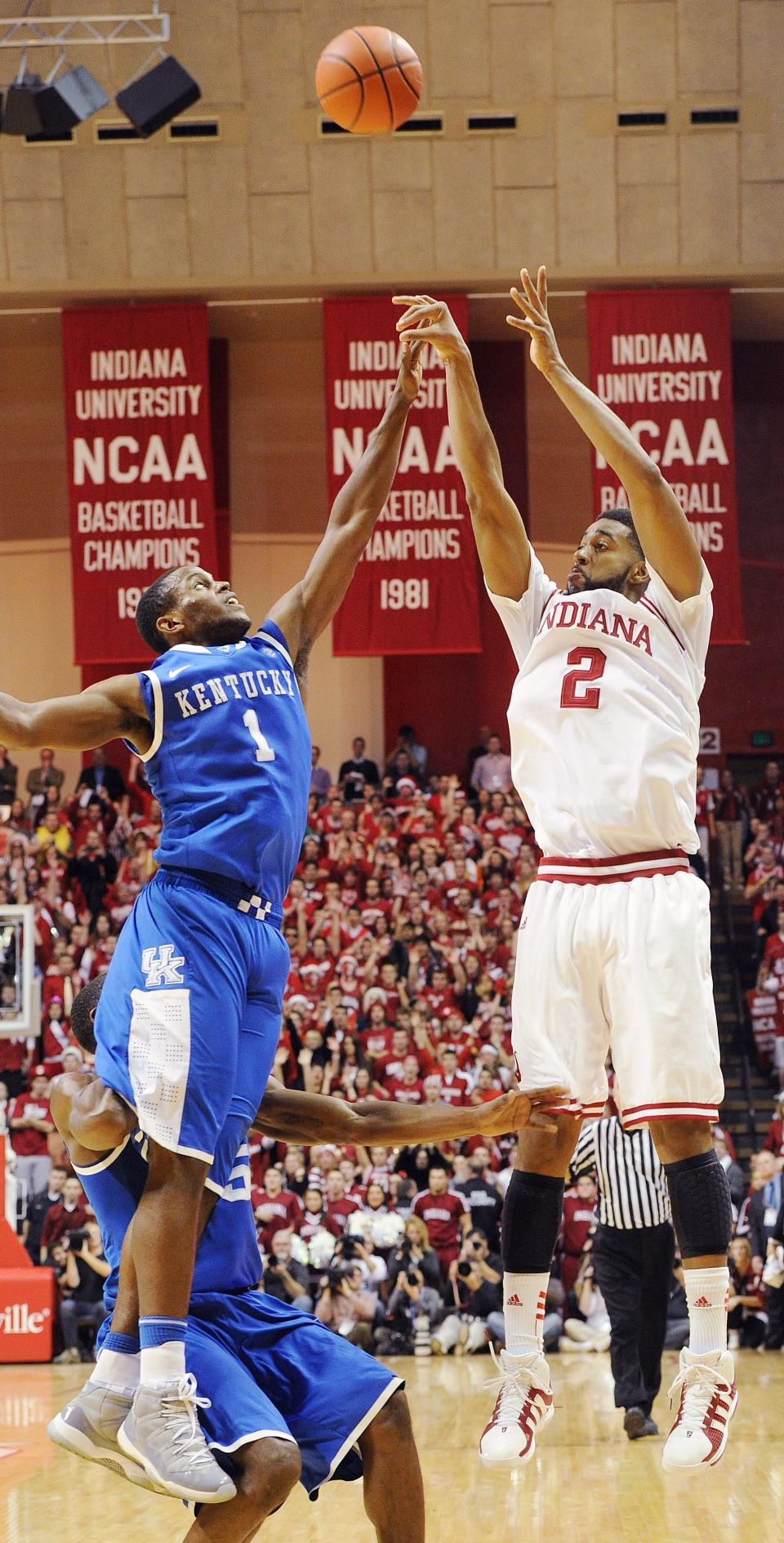 Christian Watford hits the game winning shot as time runs out. Defending is Kentucky's Darius Miller. IU defeated number one ranked Kentucky in men's basketball 73-72 at Assembly Hall in Bloomington Saturday December, 10, 2011. Rob Goebel/The Star.