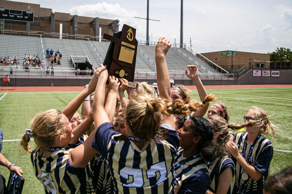 Heritage Hall celebrates after defeating Victory Christian in the Class 3A girls soccer championship Friday at Taft Stadium.