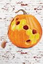 <p>Go for a naturally sweet design by carving a large honeycomb pattern across the pumpkin's front. Leave a few honeycombs intact and paint them yellow to look like the real thing. </p><p><em><a href="https://www.countryliving.com/diy-crafts/g279/pumpkin-carving-ideas/" rel="nofollow noopener" target="_blank" data-ylk="slk:Get the tutorial at Country Living »;elm:context_link;itc:0;sec:content-canvas" class="link ">Get the tutorial at Country Living »</a></em></p>