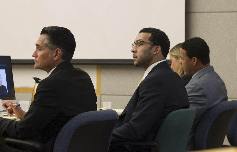Former NFL football player Kellen Winslow Jr., center, sits with his attorneys Marc Carlo, left, and Brian Watkins, third from left, during his rape trial, Monday, May 20, 2019, in Vista, Calif. (John Gibbins/The San Diego Union-Tribune via AP, Pool)