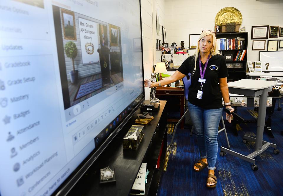 In this file photo from August 2022, Spartanburg School District 3 completed major renovations at several of their schools. Lana Greene, a high school teacher at Broome High School, shows off how she uses the new technology in the classroom.