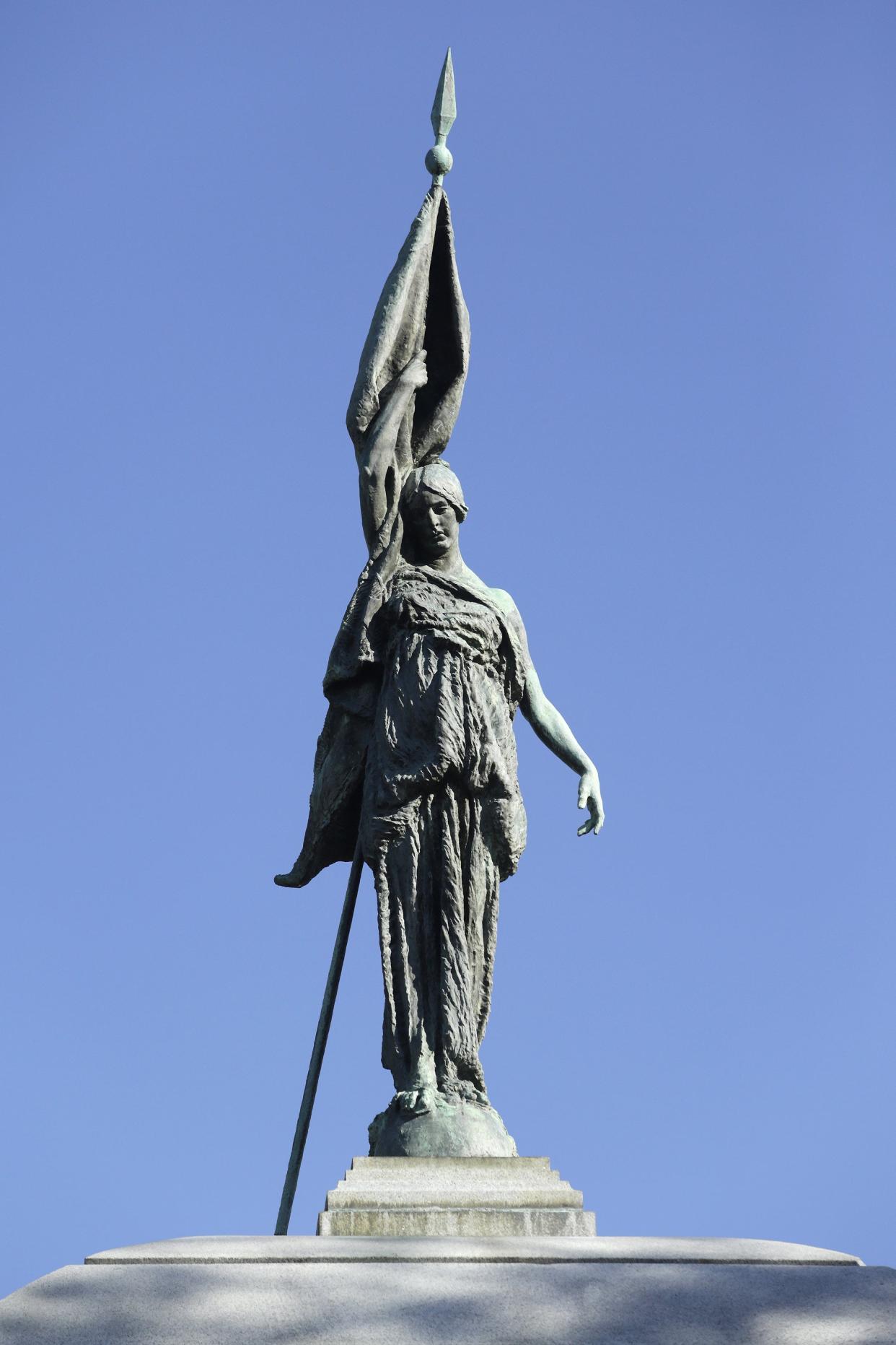 The statue atop the Confederate monument in Springfield Park depicts a woman holding a half-furled Confederate flag. City Council member Matt Carlucci used a drone to take up-close photos of the statue to show it has the markings of the Confederate flag.