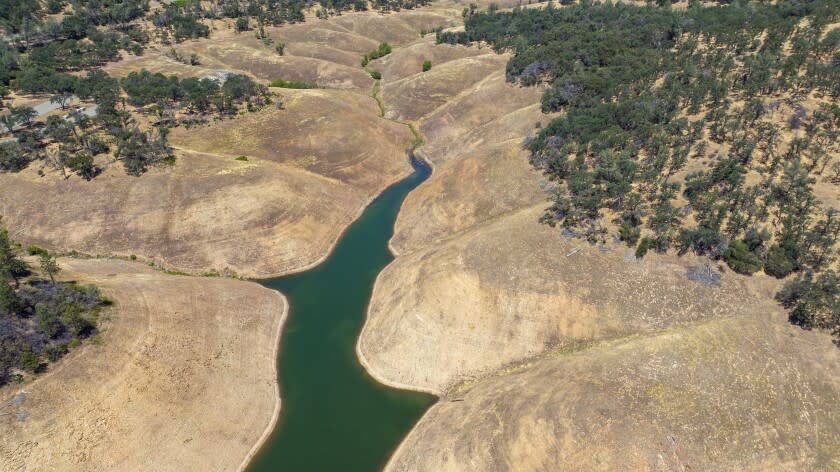 Oroville, CA - June 02: Aerial photos of the West Branch Feather River near Lime Saddle Marina show a shrinking shoreline on Lake Oroville which stands at 54% of capacity in the midst of record drought on Thursday, June 2, 2022 in Oroville, CA. (Brian van der Brug / Los Angeles Times)