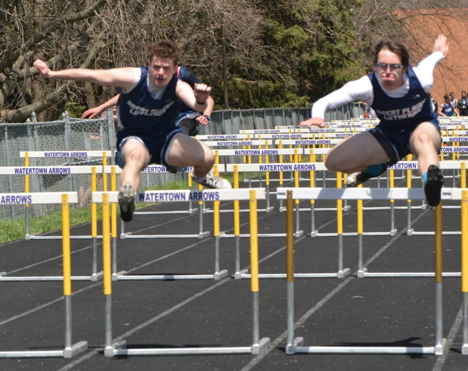 Great Plains Lutheran's Parker Walkins (right) and Jakson Cowles finished first and second, respectively, in the boys' 110-meter hurdles Tuesday during the Eastern Coteau Conference track and field meet at Allen Mitchell Field.