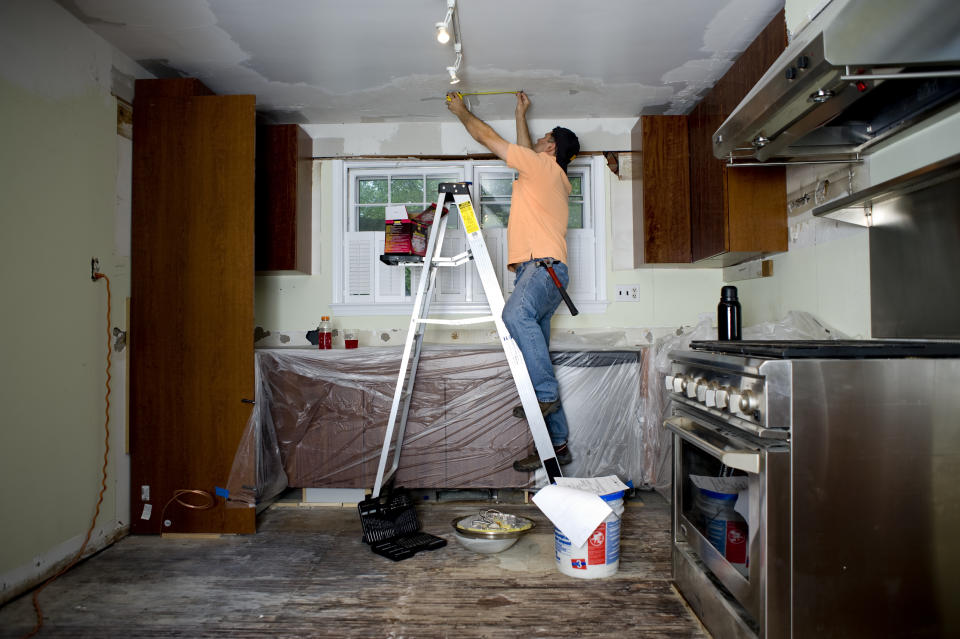 Homeowner renovating home kitchen