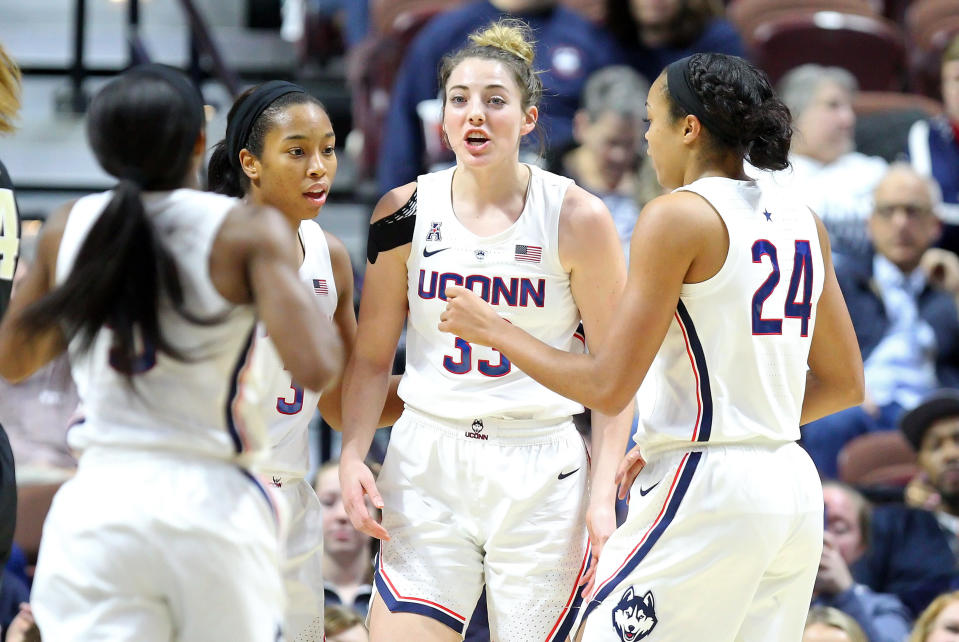 UNCASVILLE, CT - NOVEMBER 17: UConn Huskies guard Crystal Dangerfield (5), UConn Huskies guard/forward Megan Walker (3), UConn Huskies guard/forward Katie Lou Samuelson (33) and UConn Huskies forward Napheesa Collier (24) huddle during a women's college basketball game between UConn Huskies and Vanderbilt Commodores on November 17, 2018, at Mohegan Sun Arena in Uncasville, CT. (Photo by M. Anthony Nesmith/Icon Sportswire via Getty Images)