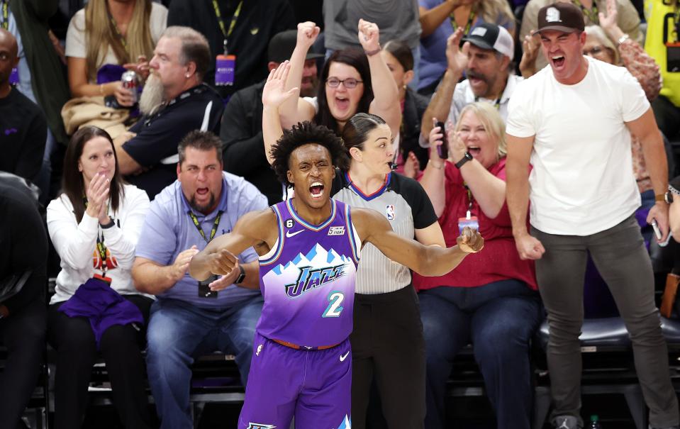 The crowd and Utah Jazz guard Collin Sexton (2) react after Sexton hit a three point shot as Utah Jazz and the Denver Nuggets play at Vivint Arena on opening night in Salt Lake City on Wednesday, Oct. 19, 2022.