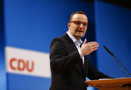 Delegate Jens Spahn holds an election campaign speech during the Christian Democratic Union (CDU) party convention in Cologne December 9, 2014. REUTERS/Kai Pfaffenbach/Files