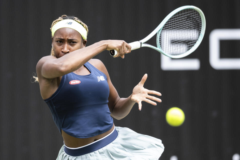 United States' Coco Gauff returns the ball to compatriot Jessica Pegula during their semi-final match at the Grass Court Championship in Berlin, Sunday, June 23, 2024. (Hannes P. Albert/dpa via AP)