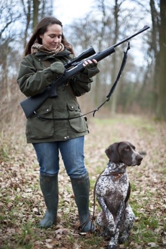 Wrapped up warmly but elegantly in a green rain- and windproof jacket, scarf, jeans, mittens and wellington boots, Johanna Hofmann, 31, is one of Germany's growing number of women hunters