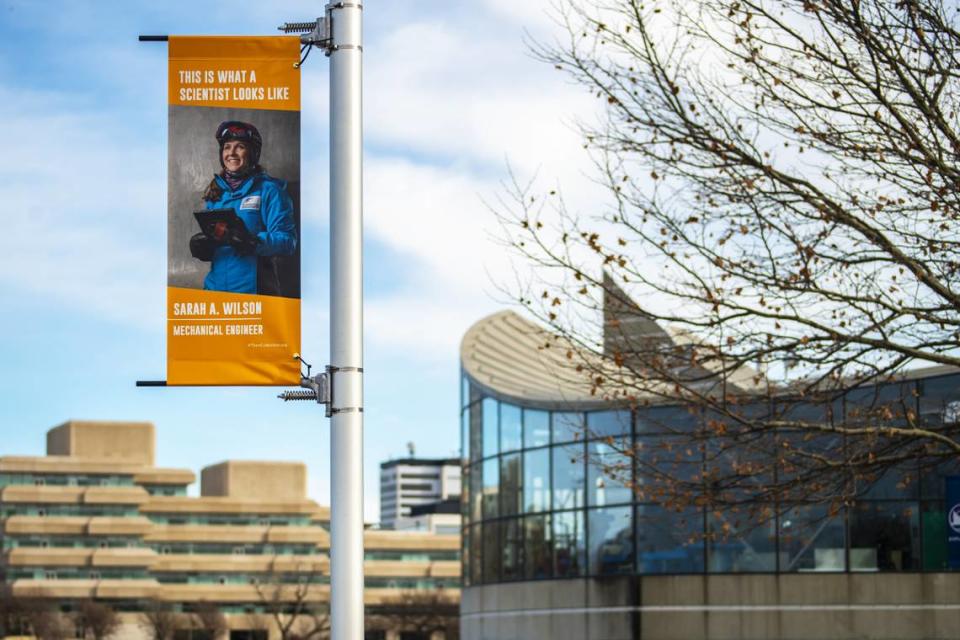 New banners recently placed on the walkway between Exploration Place and the Keeper of the Plains proclaim “This is What a Scientist Looks Like” and feature women scientists.