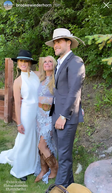 Kim, Whitney, and Luke posing together outdoors.