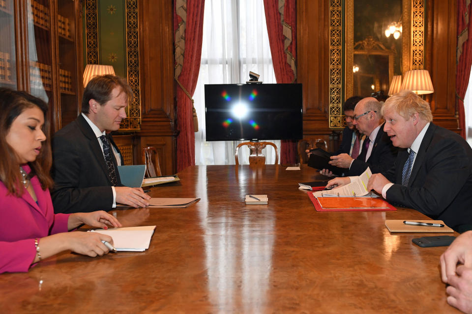 LONDON, ENGLAND - NOVEMBER 15:  Foreign Secretary Boris Johnson (R) meets with Richard Ratcliffe (2L), the husband of the detained British-Iranian woman Nazanin Zaghari-Ratcliffe arrives at the Foreign and Commonwealth Office on November 15, 2017 in London, England. Nazanin has been held in Tehran since April 2016 after a family holiday with her daughter to Iran, but has been accused of trying to overthrow the Government which she denies. (Photo by Stefan Rousseau - WPA Pool/Getty Images)