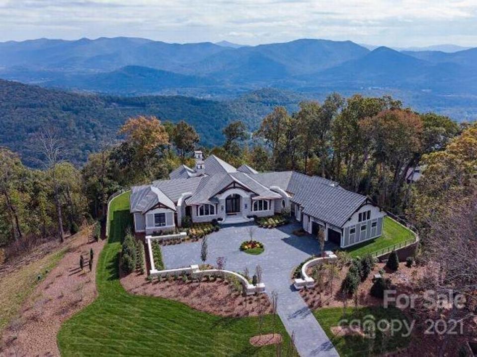 The home at 264 Skycliff Drive in the gated Wildcat Cliffs community in Asheville sold for a record $6.8 million, according to the Beverly-Hanks real estate firm, which represented the buyer.