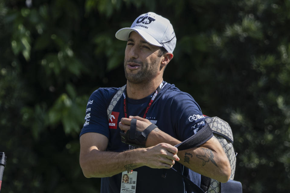 SINGAPORE, SINGAPORE - SEPTEMBER 15: Daniel Ricciardo of Australia and Scuderia AlphaTauri walks in the paddock during practice ahead of the F1 Grand Prix of Singapore at Marina Bay Street Circuit on September 15, 2023 in Singapore, Singapore. (Photo by Edmund So/Eurasia Sport Images/Getty Images)