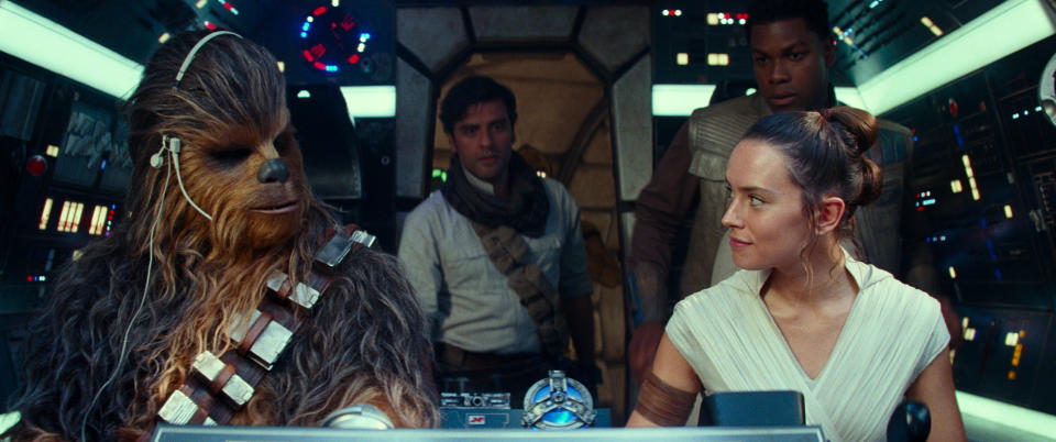 This image released by Disney/Lucasfilm shows, from left, Joonas Suotamo as Chewbacca, Oscar Isaac as Poe Dameron, Daisy Ridley as Rey and John Boyega as Finn in a scene from "Star Wars: The Rise of Skywalker." (Disney/Lucasfilm Ltd. via AP)