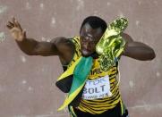 Usain Bolt of Jamaica gestures after winning the men's 200m final at the 15th IAAF World Championships at the National Stadium in Beijing, China, August 27, 2015. REUTERS/Kim Kyung-Hoon