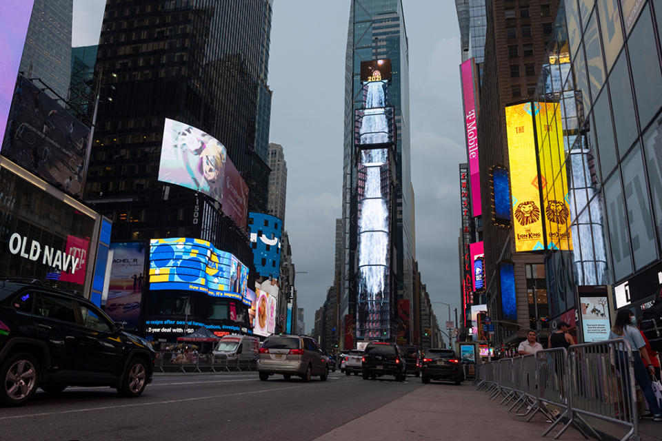 The “Serenity in the City that Never Sleeps” waterfall art installation is displayed on billboards on the One Times Square building on Aug. 10, 2021 in New York City. - Credit: Getty Images