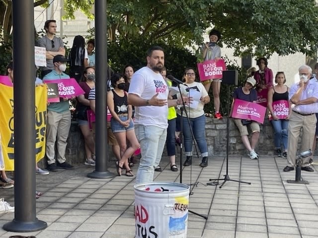 This photo provided by Panned Parenthood of Maryland shows Dr. Kyle Bukowski, the chief medical officer for Planned Parenthood of Maryland at a rally, Friday, June 24, 2022 in Baltimore. A Maryland law taking effect Friday, July 1, 2022 will enable nurse practitioners, nurse midwives and physician assistants who receive special training to perform abortions, as some states seek to expand access to the procedure after the Supreme Court overturned Roe v. Wade. Dr. Kyle Bukowski, the chief medical officer for Planned Parenthood of Maryland, is training non-physicians to perform safe abortions in Maryland. (Planned Parenthood of Maryland via AP)