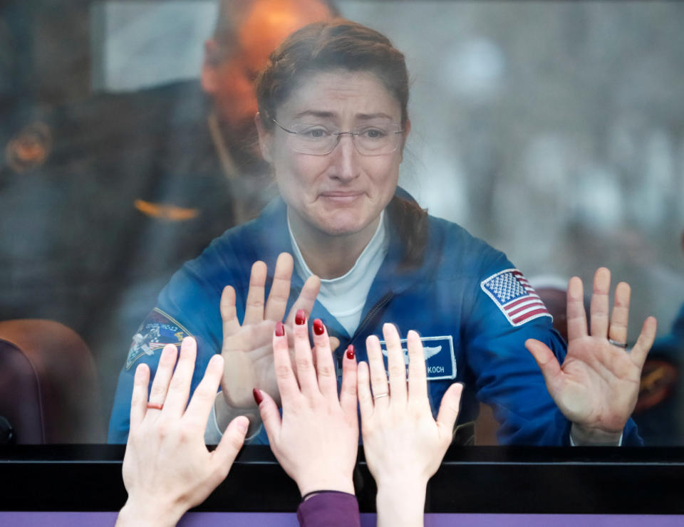 International Space Station crew member Christina Koch of the U.S. looks out a bus window before leaving for pre-flight preparation at the Baikonur Cosmodrome in Kazakhstan on March 14, 2019. (Photo: Shamil Zhumatov/Reuters)