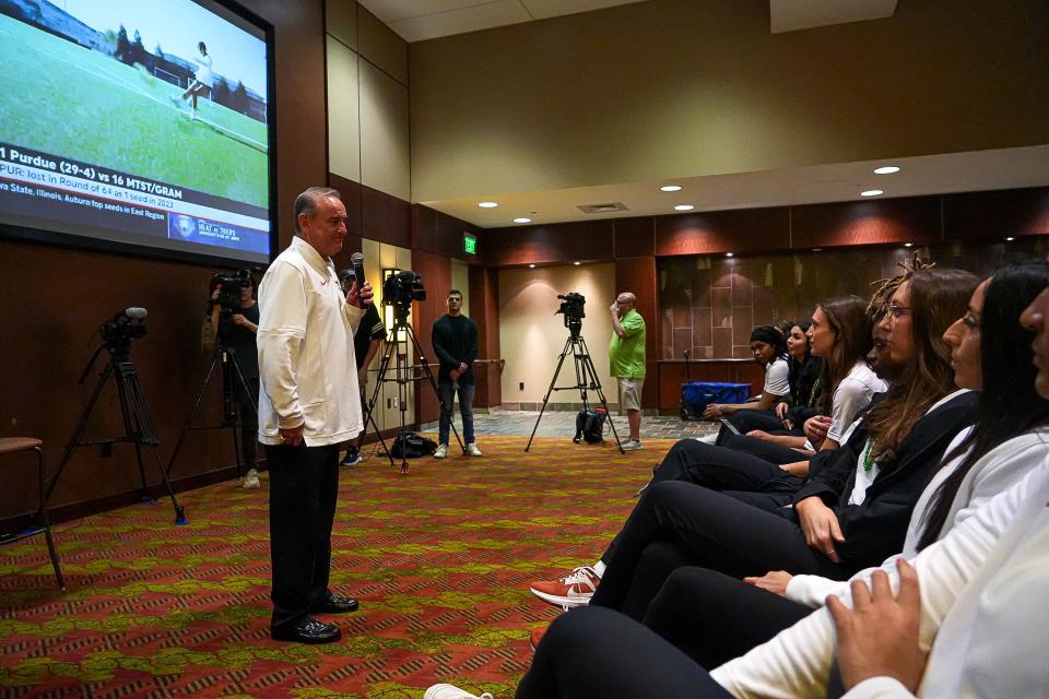 Texas women's basketball coach Vic Shaefer speaks to his team before the Horns were named a No. 1 seed during the NCAA Tournament selection show. Texas hosts Drexel in a first-round contest at Moody Center on Friday.