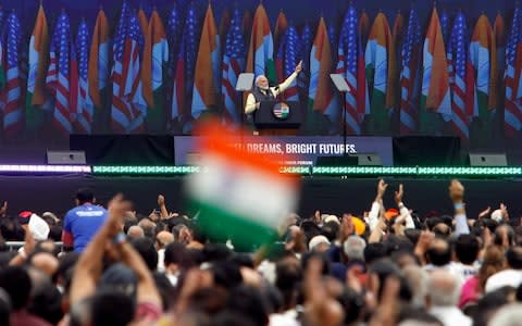 The Indian prime minister received a hero's welcome on the eve of the summit at a 'Howdy, Modi' rally in Texas, where he was accompanied by Donald Trump - Credit: Daniel Kramer/Reuters&nbsp;