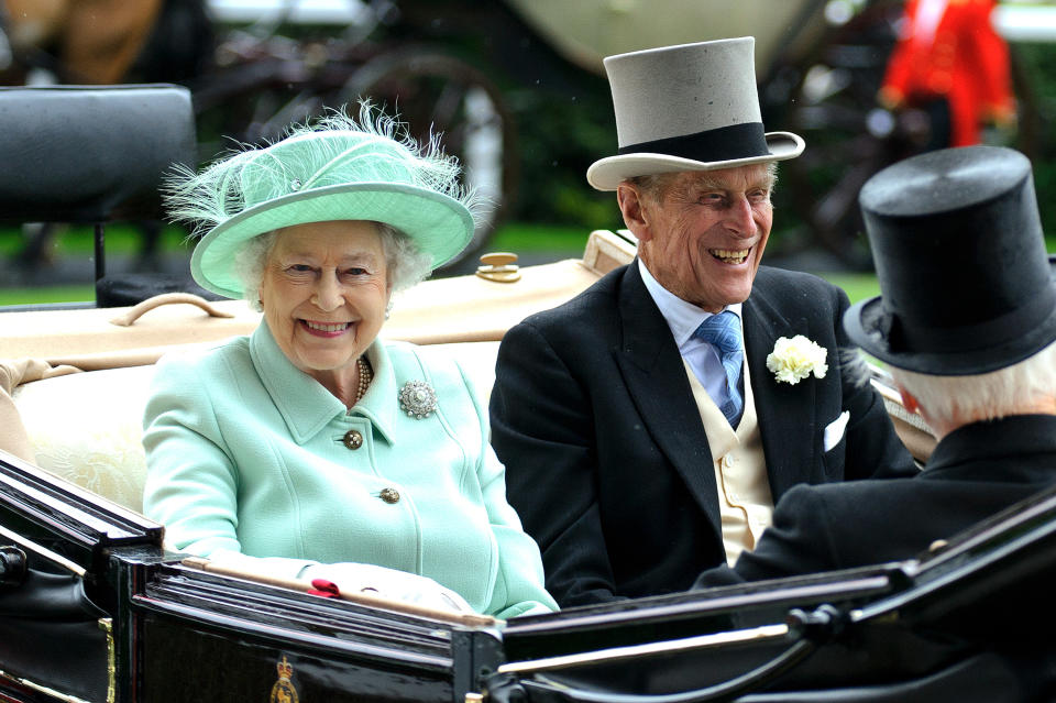 Queen Elizabeth II and Prince Philip, Duke of Edinburgh attends Ladies Day during Royal Ascot at Ascot Racecourse on June 21, 2012 in Ascot, England. (Photo by Ben Pruchnie/Getty Images)