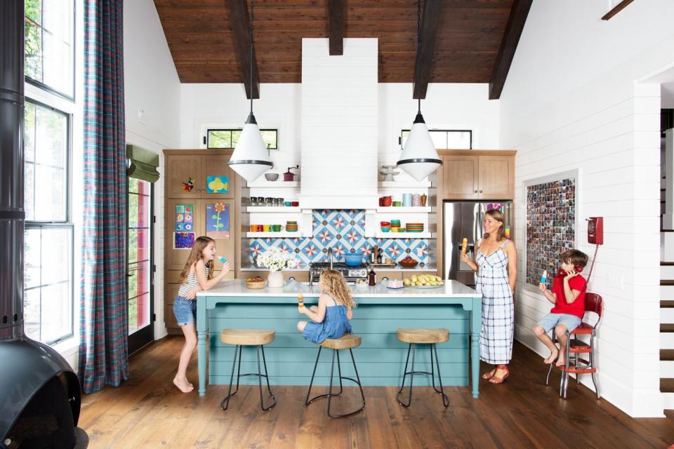 lakehouse kitchen with turquoise blue cabinets