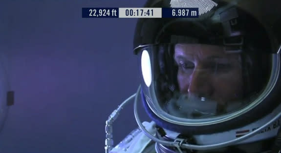 Felix Baumgartner is shown inside his capsule as he ascends in preparation for his record-breaking jump Oct 14, 2012.