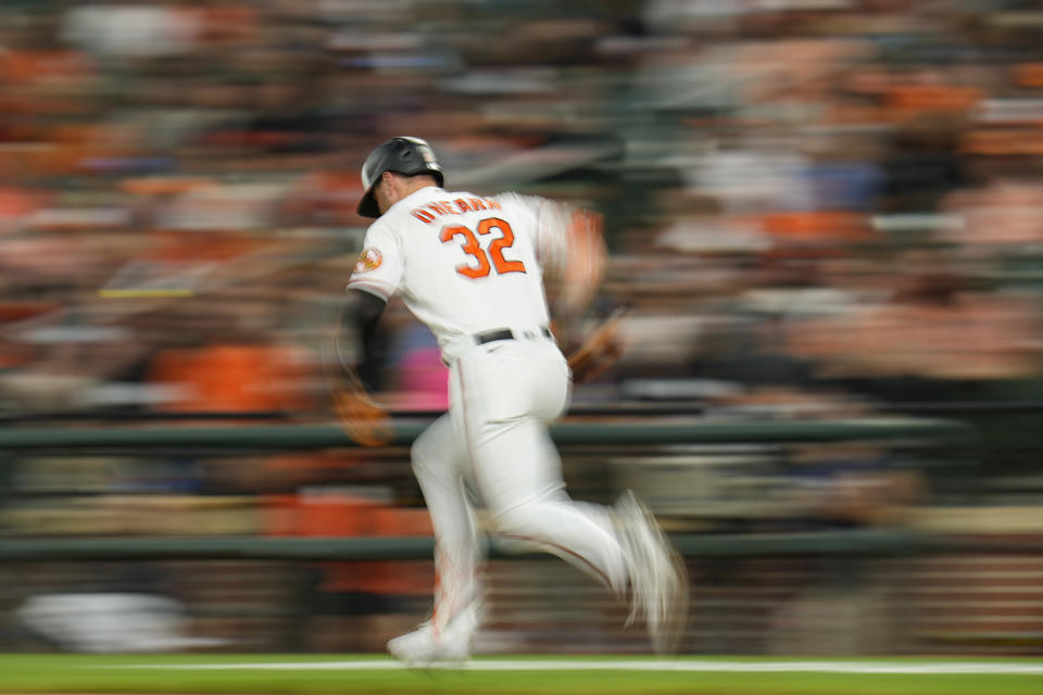 Baltimore Orioles' Ryan O'Hearn runs while collecting an infield hit against the Chicago White Sox during the second inning of a baseball game, Monday, Aug. 28, 2023, in Baltimore. (AP Photo/Julio Cortez)