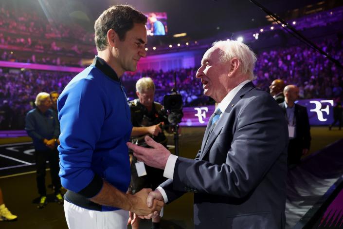 Roger Federer of Team Europe speaks with Rod Laver following their final match during Day One of the Laver Cup at The O2 Arena.