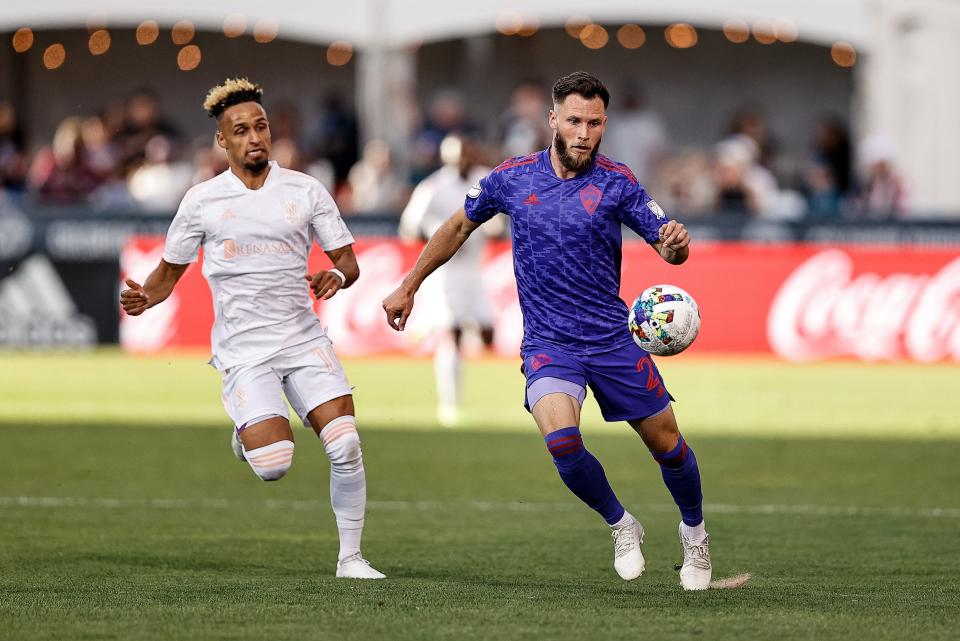 May 28, 2022; Commerce City, Colorado, USA; Colorado Rapids defender Keegan Rosenberry (2) fields the ball ahead of Nashville SC midfielder Hany Mukhtar (10) in the first half at Dick's Sporting Goods Park.