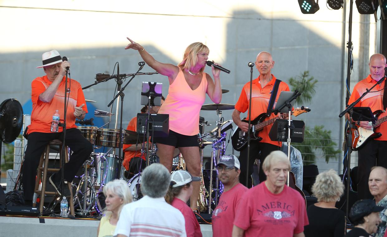 LaFlavour performs during the first Massillon Summer Concert Series performance held on Duncan Plaza. The 2024 concerts kick off June 20 with China Grove, a Doobie Brothers tribute band.