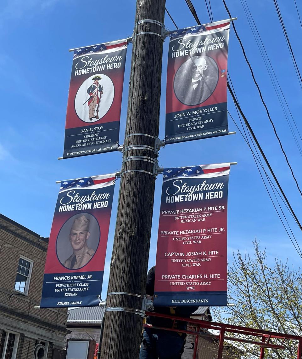 Stoystown's Hometown Hero banners include veterans such as Daniel Stoy, the founder of Stoystown, top left, and John W. Mostoller, a Congressional Medal of Honor recipient, top right.