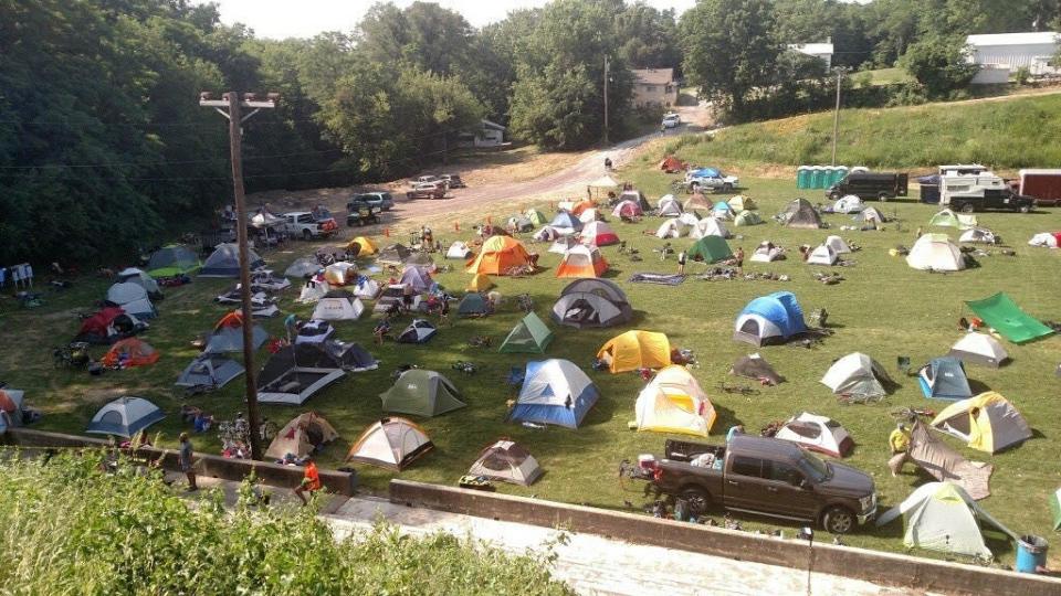 Tents scatter a Big BAM (Bicycle Across Missouri) campground during a previous year's tour. The six-day bicycle tour is along Route 66 this year, with overnight stays in Joplin, Willard, Lebanon, Waynesville, Rolla, Cuba and Eureka. Overnight campsites include live musical entertainment, food, a shower trailer, a phone-charging trailer and morning coffee.