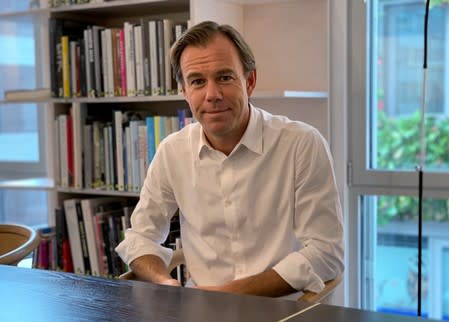 FILE PHOTO: H&M CEO Karl-Johan Persson poses for a picture at the retailer's headquarters in Stockholm