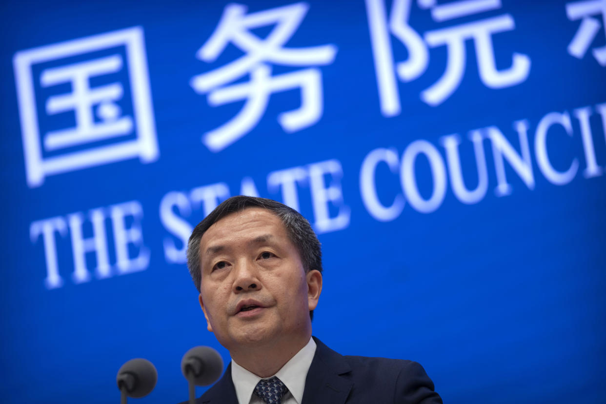 Shen Hongbing, the director of the Chinese Center for Disease Control and Prevention, speaks at a press conference on the origins of COVID-19 at the State Council Information Office in Beijing, Saturday, April 8, 2023. (AP Photo/Mark Schiefelbein)