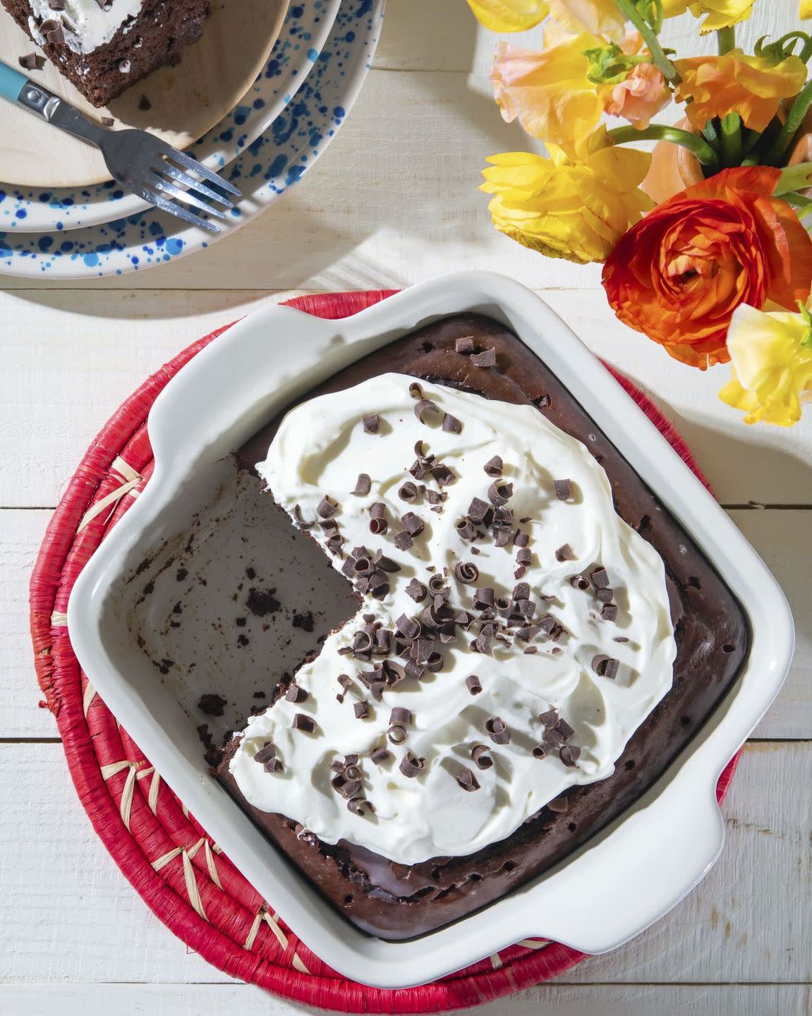chocolate tres leches cake in a square baking dish