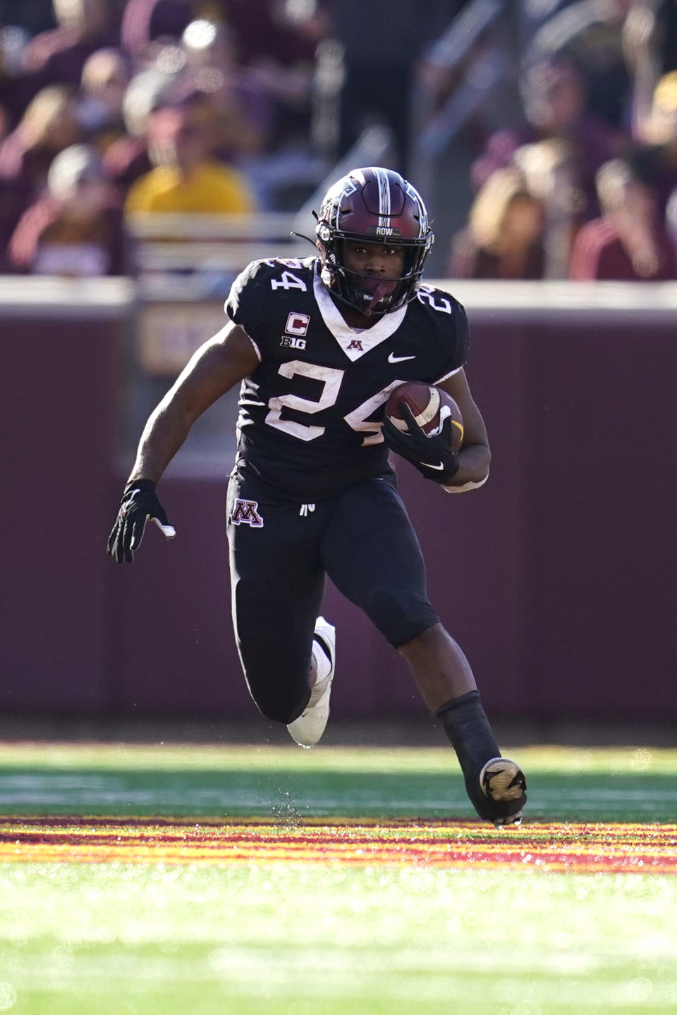 Minnesota running back Mohamed Ibrahim (24) runs with the ball during the second half of an NCAA college football game against Rutgers, Saturday, Oct. 29, 2022, in Minneapolis. (AP Photo/Abbie Parr)